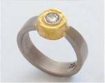 Brillantring 750er Weigold und 900er Gelbgold Brillant 0,23 ct lupenrein River